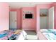 Spacious bedroom with twin beds and a TV at 2622 Lodi Cir # 103, Kissimmee, FL 34746