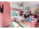 bedroom with twin beds, princess-themed decor, and a castle mural at 2622 Lodi Cir # 103, Kissimmee, FL 34746