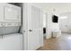 Modern stacked washer and dryer for easy laundry access at 2622 Lodi Cir # 103, Kissimmee, FL 34746