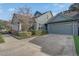 Gray house with white columns, large driveway and manicured hedges at 2801 Elizabeth Ave, Orlando, FL 32804