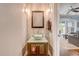 Modern powder room with glass sink and dark vanity at 2801 Elizabeth Ave, Orlando, FL 32804