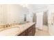 Bright bathroom with dual sinks and granite countertops at 291 Lasso Dr, Kissimmee, FL 34747