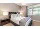 Cozy bedroom featuring a plush bed and ample natural light at 291 Lasso Dr, Kissimmee, FL 34747