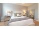 Primary bedroom with king-size bed and elegant decor at 291 Lasso Dr, Kissimmee, FL 34747