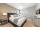 Primary bedroom with a king-size bed and sitting area at 291 Lasso Dr, Kissimmee, FL 34747