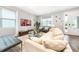 Bright and airy living room featuring comfortable seating and a large TV at 291 Lasso Dr, Kissimmee, FL 34747