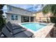 Inviting backyard oasis with a refreshing pool and spa at 291 Lasso Dr, Kissimmee, FL 34747