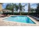 Inviting pool area with spa and plenty of lounge chairs at 291 Lasso Dr, Kissimmee, FL 34747