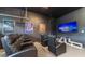 Home theater with comfy seating and large screen TV at 291 Lasso Dr, Kissimmee, FL 34747