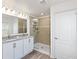 Bathroom with double vanity and large shower at 3220 Sweet Acres Pl, St Cloud, FL 34772