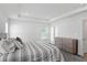 Main bedroom with large bed and neutral decor at 3220 Sweet Acres Pl, St Cloud, FL 34772