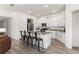 Modern kitchen featuring white cabinets and granite countertops at 3220 Sweet Acres Pl, St Cloud, FL 34772