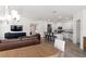 Modern kitchen with white cabinets, island, and stainless steel appliances at 3220 Sweet Acres Pl, St Cloud, FL 34772