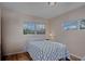 Bedroom with double bed and two windows with natural light at 3324 Toasy Dr, Orlando, FL 32806