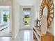 Bright and airy foyer with view to backyard at 33487 Tacking Way, Sorrento, FL 32776