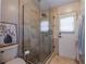 Clean bathroom with a toilet and a walk in shower at 349 New Waterford Pl, Longwood, FL 32779