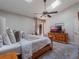 Spacious primary bedroom with a king-size bed and plenty of natural light at 349 New Waterford Pl, Longwood, FL 32779