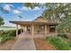 Charming community clubhouse building with covered walkway, water fountain, and green space at 349 New Waterford Pl, Longwood, FL 32779