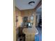 Bar area, complete with a bar, sink, and a mirror, ideal for entertaining at 357 Wade Park Ct, Davenport, FL 33897