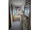 Well-lit bathroom featuring dual sinks, a bathtub, and decorative nautical accents at 357 Wade Park Ct, Davenport, FL 33897