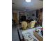 A cozy sitting area with a ceiling fan, comfortable seating, and a Christmas tree at 357 Wade Park Ct, Davenport, FL 33897