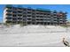 Beachfront condo building with ocean views and balconies at 4799 S Atlantic Ave # 5020, Ponce Inlet, FL 32127