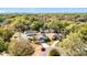Aerial view of homes in a community surrounded by mature trees at 511 Coventry Ct, Mount Dora, FL 32757