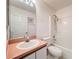 Bathroom with vanity, sink, mirror, and shower-tub combo at 511 Coventry Ct, Mount Dora, FL 32757