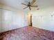 Bedroom with ceiling fan and closet at 511 Coventry Ct, Mount Dora, FL 32757