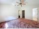 Spacious bedroom with neutral walls and a ceiling fan at 511 Coventry Ct, Mount Dora, FL 32757