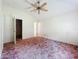 Main bedroom with vaulted ceilings and entrances to other rooms at 511 Coventry Ct, Mount Dora, FL 32757