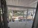 Covered porch with view of walkway and neighborhood at 520 N Orange, Orange City, FL 32763