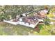 Overhead view of the home, showing the backyard, roof, and surrounding neighborhood at 5300 Lido St, Orlando, FL 32807