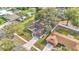 Aerial view of the home, showing the roof, driveway, and landscaping at 5300 Lido St, Orlando, FL 32807