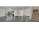 Bright and airy living room with hardwood floors and staircase at 5419 Fairwood Way # 305, Orlando, FL 32808