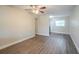 Dining area with wood-look floors and view to kitchen at 5624 Balboa Dr, Orlando, FL 32808