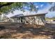 Ranch style home with a large backyard and mature trees at 5624 Balboa Dr, Orlando, FL 32808