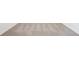 Close up of the light gray carpet with fresh vacuum lines at 5680 Brosnan Rd, St Cloud, FL 34771