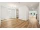 Bright dining area with wood floors, a chandelier, and views of the backyard at 5680 Brosnan Rd, St Cloud, FL 34771