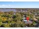 Property location shown via pin; lake and homes in background at 817 Antonette Ave, Winter Park, FL 32789