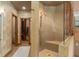 Spa-like bathroom with walk-in shower, soaking tub, and walk-in closet at 817 Antonette Ave, Winter Park, FL 32789