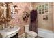 Unique bathroom with patterned walls and vintage sink at 817 Antonette Ave, Winter Park, FL 32789