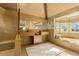 Spa-like bathroom with double vanity and soaking tub at 817 Antonette Ave, Winter Park, FL 32789