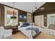 Spacious bedroom with metal bed frame and unique decor at 817 Antonette Ave, Winter Park, FL 32789