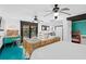 Open concept bedroom with kitchen, teal floors, and patio access at 817 Antonette Ave, Winter Park, FL 32789