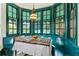 Charming built-in breakfast nook with window seat and decorative table at 817 Antonette Ave, Winter Park, FL 32789