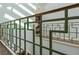 Close-up of a unique green metal railing with geometric patterns, adding architectural interest at 817 Antonette Ave, Winter Park, FL 32789