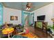 Living room with unique decor and hardwood floors at 817 Antonette Ave, Winter Park, FL 32789