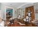 Sitting room with a cowhide rug and unique decor at 817 Antonette Ave, Winter Park, FL 32789