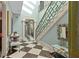 Elegant staircase with skylight and geometric railing at 817 Antonette Ave, Winter Park, FL 32789